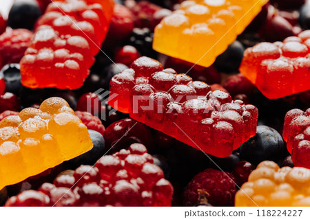 Colorful natural berry marmalade on fresh mixed fruits and berries, healthy sweet indulgence Colorful natural berry marmalade on fresh mixed fruits and berries, healthy sweet indulgence 118224227