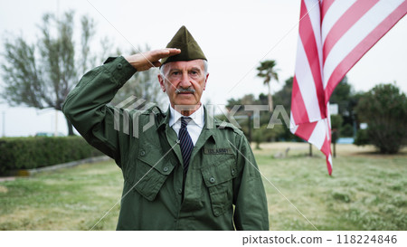 Sad Elderly Veteran Remembers Fallen In Second War at Memorial Day Cemetery Sad Elderly Veteran Remembers Fallen In Second War at Memorial Day Cemetery 118224846