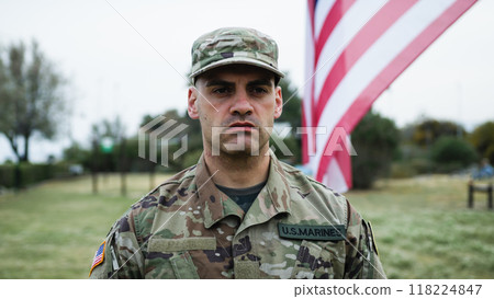 American Serviceman Military Salutes At Cemetery For Memorial Day 118224847