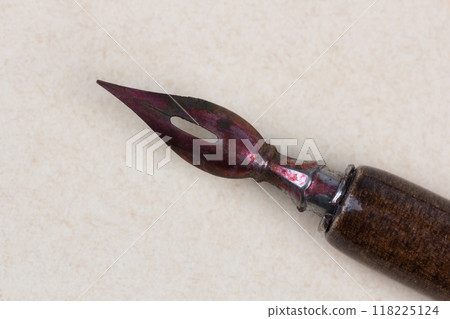 Fountain pen on an antique textured paper. Fountain pen on an antique textured paper. 118225124