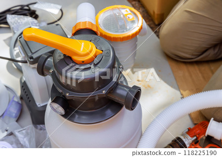 Assembling sand filter system tank using equipment that is used to clean pools swimming pool 118225190