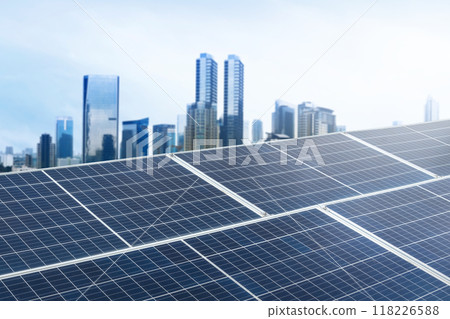 A city skyline with a large solar panel on top 118226588