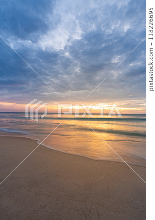 Beautiful sunset at famous Natai beach in Phang nga, southern part of thailand close to Phuket. 118226695
