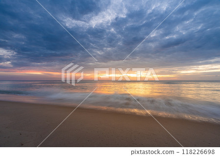 Beautiful sunset at famous Natai beach in Phang nga, southern part of thailand close to Phuket. 118226698