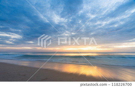 Beautiful sunset at famous Natai beach in Phang nga, southern part of thailand close to Phuket. 118226700