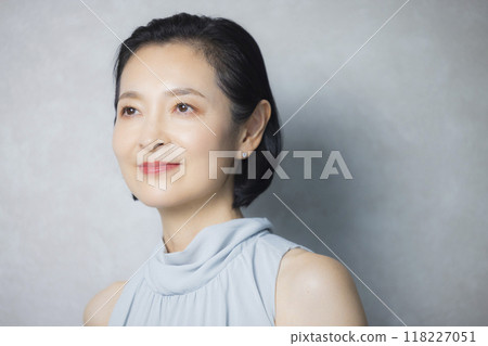 Dressed up middle-aged woman Dressed up middle-aged woman 118227051