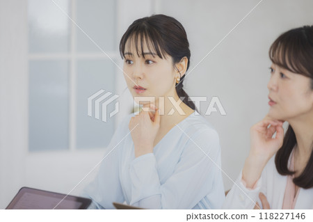 A woman having a meeting A woman having a meeting 118227146