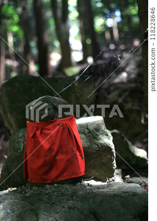 Buddha statue on the mountain path Buddha statue on the mountain path 118228646