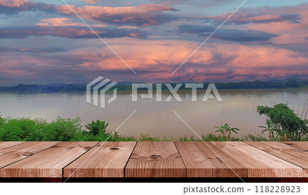 perspective wooden board over blurred lake perspective wooden board over blurred lake 118228923