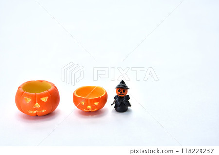 Halloween pumpkin simple miniature white background 118229237