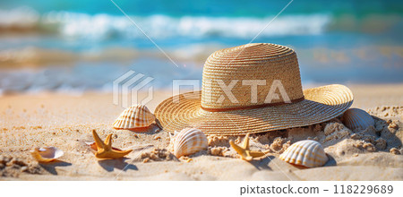 Summer straw hat, sea shells on beach sand. Vacation, leisure, Sunbathing and relaxing concept 118229689