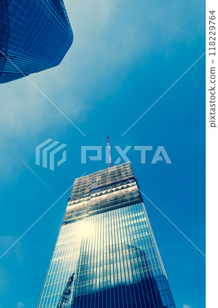 Large-scale construction underway and blue skies Takanawa Gateway 2024.09 e-3 Warm colors 118229764