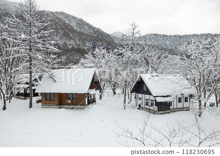 a small village in the winter 118230695
