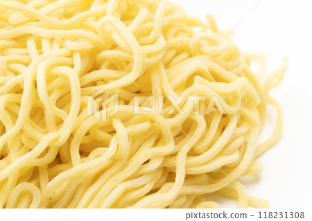 Close-up of raw medium-thick curly noodles 118231308