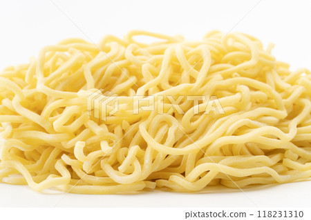 Close-up of raw medium-thick curly noodles Close-up of raw medium-thick curly noodles 118231310