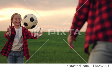 mother playing with child kid soccer field, child playing soccer ball with parent green lawn, happy family, grassy field ball, kids playing soccer, denim jeans football, outdoor sports activity, park 118232021