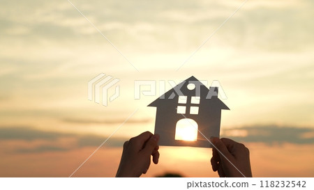 hands holding paper house, window sunset ray, happy family mortgage build new house, down payment assistance, real estate investment trusts, mortgage broker benefits, home automation systems, green 118232542