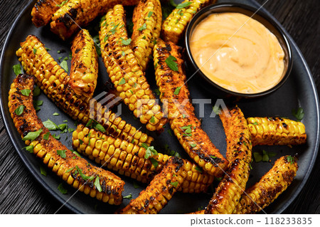 bbq corn ribs on a plate, top view bbq corn ribs on a plate, top view 118233835