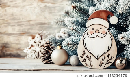 Rustic wooden Santa ornament with Christmas tree, snow, and holiday decor on a wooden background. Rustic wooden Santa ornament with Christmas tree, snow, and holiday decor on a wooden background. 118234178