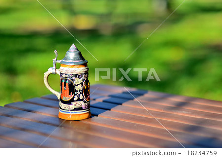 German beer mug with lid, park German beer mug with lid, park 118234759