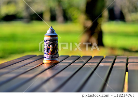 German beer mug with lid, park German beer mug with lid, park 118234765