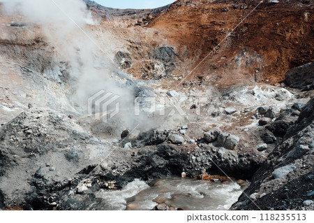 View of mountains and volcanoes from the edge of the crater View of mountains and volcanoes from the edge of the crater 118235513
