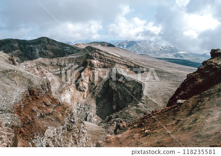 View of mountains and volcanoes from the edge of the crater 118235581