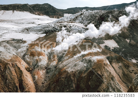 View of mountains and volcanoes from the edge of the crater 118235583
