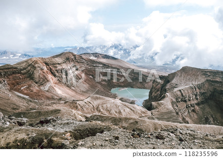 View of mountains and volcanoes from the edge of the crater 118235596
