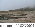 View of mountains and volcanoes from the edge of the crater 118235604