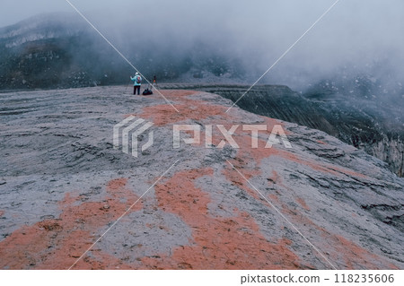 View of mountains and volcanoes from the edge of the crater 118235606