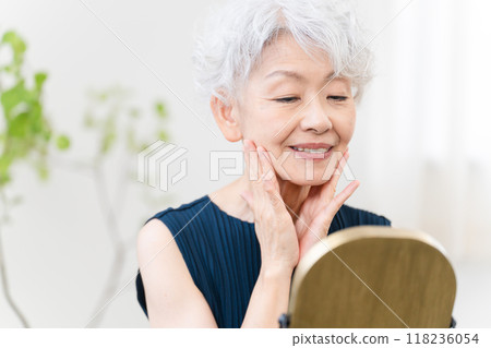 Senior woman doing skin care Beauty image 118236054