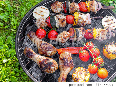 various grilled meat and vegetables 118236095