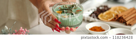 Woman With Handmade Candle With Aroma Herbs 118236428