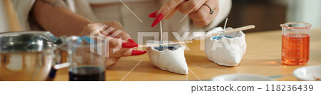 Woman Making Candles In Forms Woman Making Candles In Forms 118236439