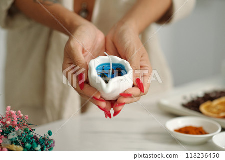 Woman Making Handmade Aroma Candle Woman Making Handmade Aroma Candle 118236450