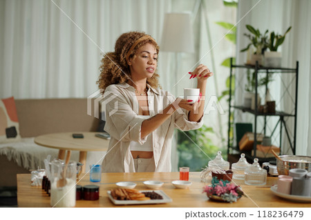 Woman Doing Her Hobby Of Making Candles Woman Doing Her Hobby Of Making Candles 118236479