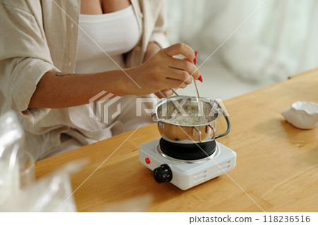 Woman Making Handmade Candles At Home Woman Making Handmade Candles At Home 118236516