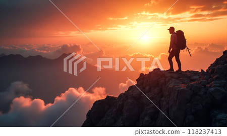 Mountain climber reaches summit at sunrise, success and achievement in nature splendor, victorious ascent against vibrant sky Mountain climber reaches summit at sunrise, success and achievement in nature splendor, victorious ascent against vibrant sky 118237413