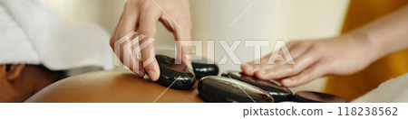 Experiencing Rejuvenating Hot Stone Massage Therapy 118238562