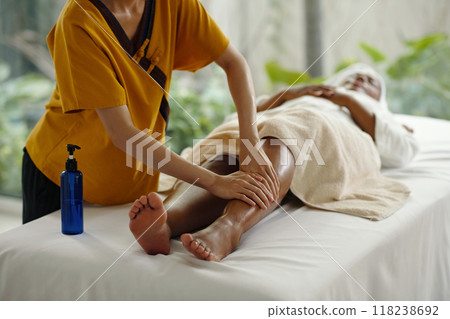 Relaxing Spa Treatment with Foot Massage in Progress 118238692
