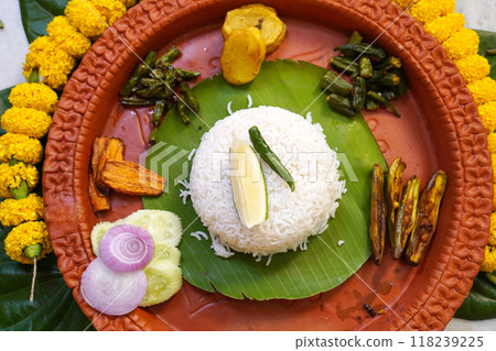 Bengali Cuisine served in earthenware during Jamaisasti Occasion 118239225