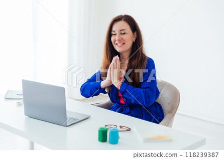 Business Woman Doing Meditation With Laptop Online Business Woman Doing Meditation With Laptop Online 118239387