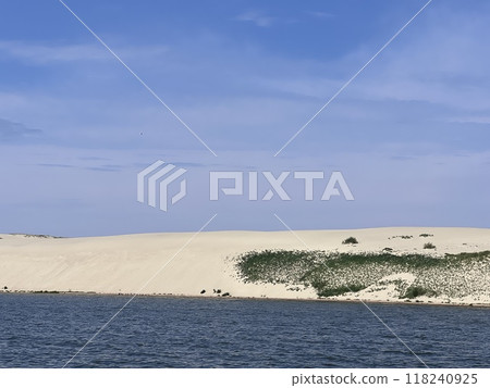 Sand dunes in a cloudy atmosphere in the Empty Quarter desert in the borders of the Sultanate of Oman. Sand dunes in a cloudy atmosphere in the Empty Quarter desert in the borders of the Sultanate of Oman. 118240925
