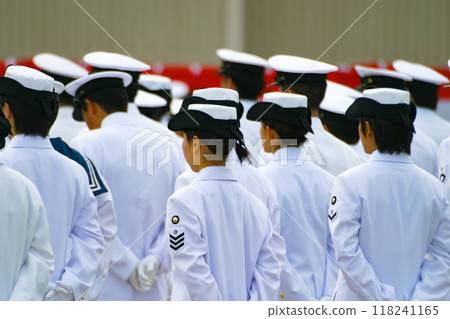 Maritime Self-Defense Force members line up in white uniforms 118241165