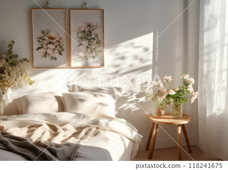 Modern Scandinavian white bedroom interior with flowers on wooden stool. posters above bed. Aesthetic and cozy bedroom with beautiful sunlight and shadows. Modern Scandinavian white bedroom interior with flowers on wooden stool. posters above bed. Aesthetic and cozy bedroom with beautiful sunlight and shadows. 118241675