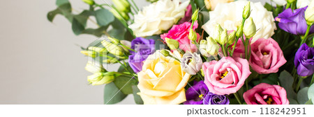 This seasonal bouquet of roses, eucalyptus, and eustoma in soft pink, white, and purple tones makes an ideal gift for anniversaries, birthdays, or any special event, banner This seasonal bouquet of roses, eucalyptus, and eustoma in soft pink, white, and purple tones makes an ideal gift for anniversaries, birthdays, or any special event, banner 118242951