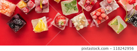Ice cubes with frozen berries and fruits Ice cubes with frozen berries and fruits 118242956