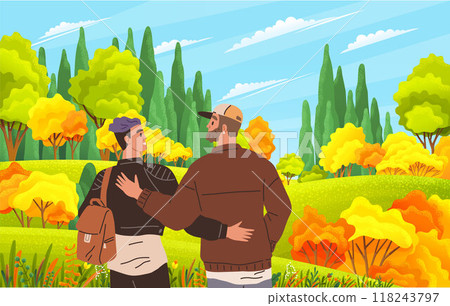 Two friends walking arm in arm through a vibrant autumn forest. The trees are bursting with bright yellow, orange, and green leaves, creating a warm and inviting natural setting. 118243797
