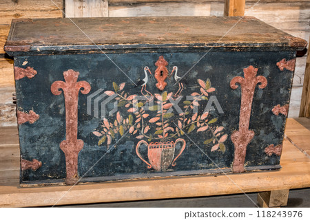 Old wooden chest against wooden wall Old wooden chest against wooden wall 118243976